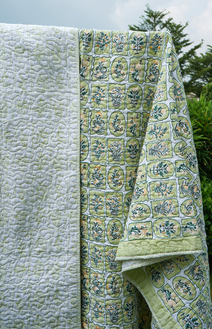 Green and yellow motif tiles mulmul quilt